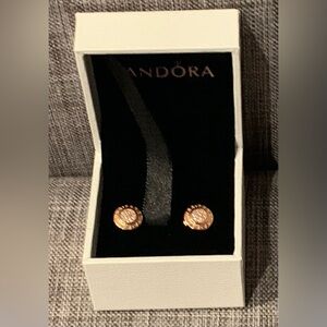 Pandora rose color studs.beautiful crystal center. NIB